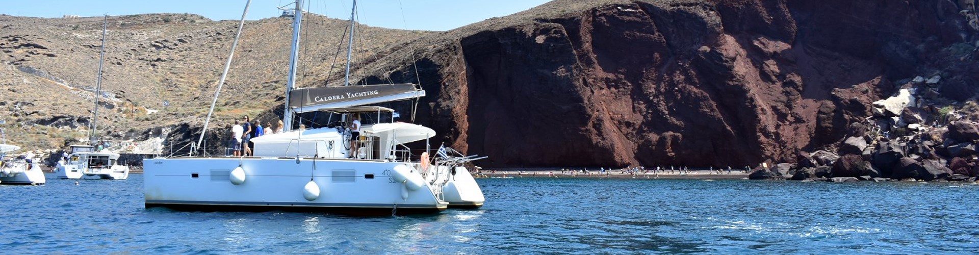 Photo of Private Catamaran Cruise in Santorini with a freshly cooked Meal & Drinks
