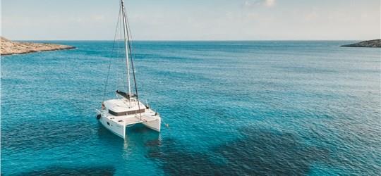 Photo of Private Catamaran Trip through Caldera's Wonders with Meal & Drinks included