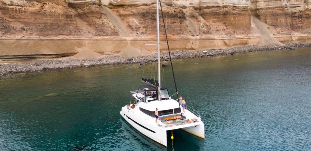 Photo of Sailing Catamaran Cruise in Santorini with buffet meal and drinks