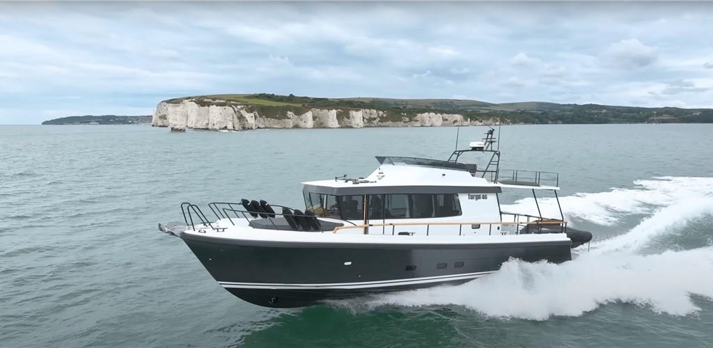 Photo of Exclusive Santorini Private Adventure on a 4x4 Sea Vessel with Food & Drinks 