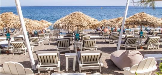 Photo of Chill Out on a Sunbed at Chilli Beach Bar Restaurant Santorini