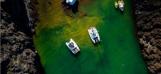 Photo of Santorini Catamaran Adventure with Full BBQ Meal & Drinks