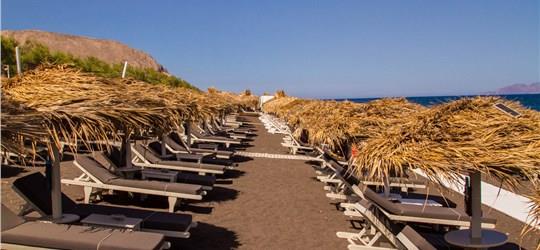 Photo of Chill Out on a Sunbed at Chilli Beach Bar Restaurant Santorini