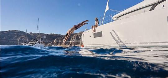 Photo of Private Luxury Catamaran Cruise in Santorini with full BBQ meal & Drinks