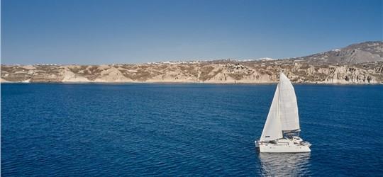 Photo of Classic Catamaran Cruise in Santorini with Food & Drinks