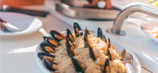 Photo of Private Sailing Cruise in Santorini with Seafood BBQ dinner/lunch and Drinks