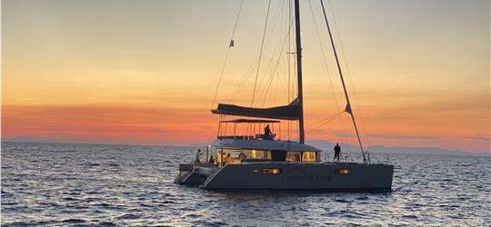 Photo of Romantic Catamaran Cruise in Santorini with lunch or dinner on board 