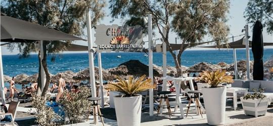 Photo of Chill Out on a Sunbed at Chilli Beach Bar Restaurant Santorini