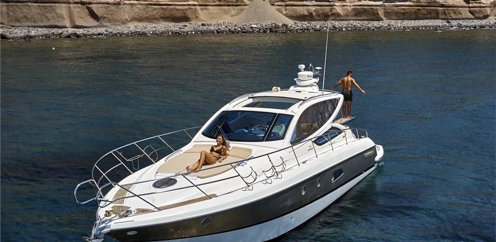 Photo of Luxury Private Yacht Tour of Santorini's Shoreline with Meal and Drinks