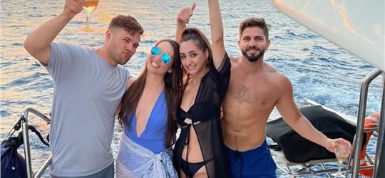 Photo of Scenic Catamaran Trip around Santorini with BBQ and Beverages