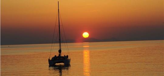 Photo of Luxurious Catamaran Cruise in Santorini with BBQ and Drinks