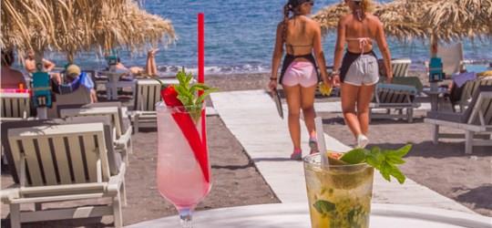 Photo of Chill Out on a Sunbed at Chilli Beach Bar Restaurant Santorini